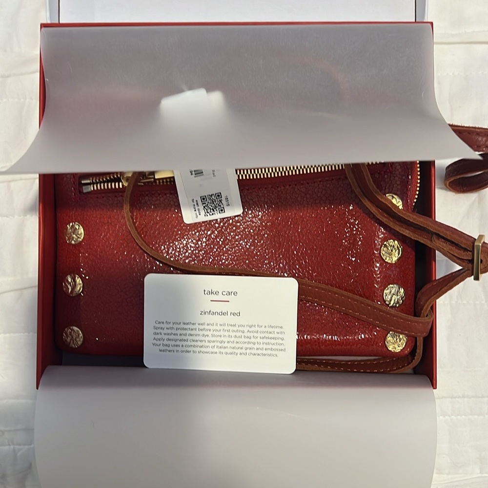 Hammett Nash Zinfandel red. removable, adjustable, Crossbody strap and wristlet.